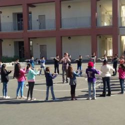 Students playing their instruments outside.